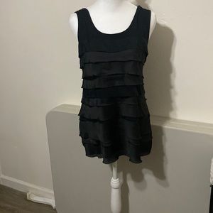 Cupio lg layered front tank, solid in back, stretchy. Very cute.